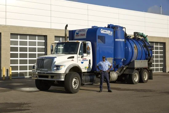 Grease Trap Pumping tech-kyle-grease-trap-pumping-guzzler-panel