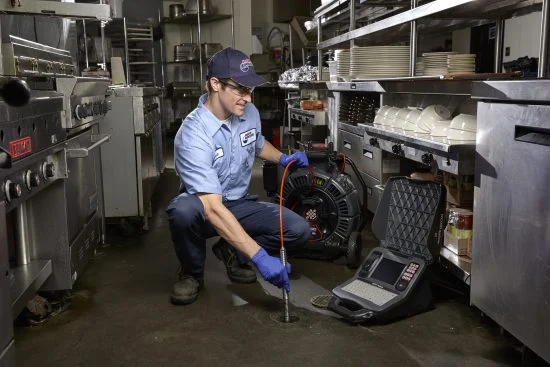 When to Hire a Commercial Plumber tech-mark-video-camera-inspection-in-restaurant