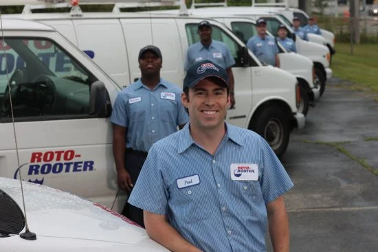 Septic Tank Services Septic Systems Installation Team In Uniform Standing Side Of Car