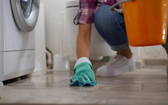 Washing Machine Repair and Installation Washing Machine Repair and Installation - Lady With Cloth And Bucket Cleaning The Floor