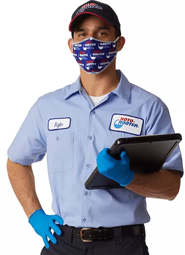 Roto Rooter Plumber Holding Files And Wearing Mask