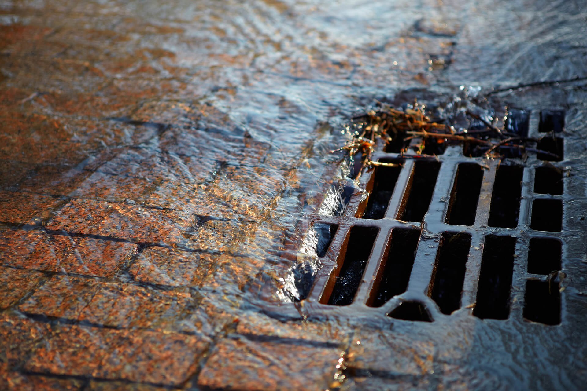 roto-rooter-Storm Sewer Cleaning Services - Water Passing In Sewer