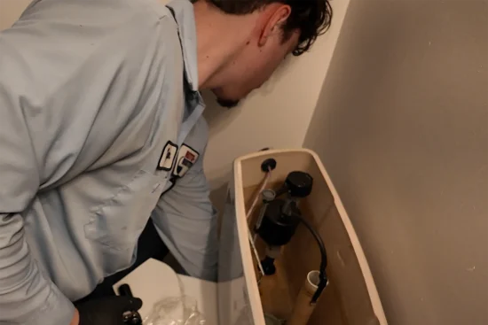 Is Your Toilet Leaking? How to Prevent Water Damage and Know When to Call a Plumber Residential Toilet Repair tech
