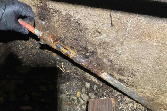 water leak corroded pipe roto rooter